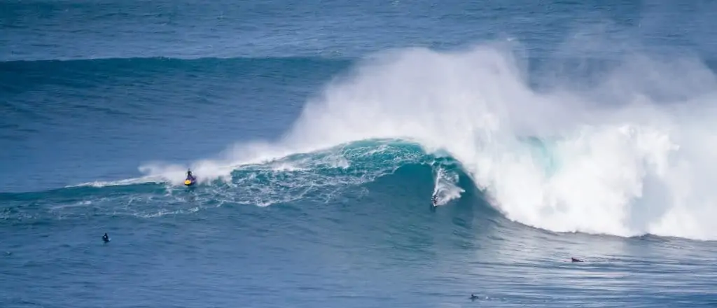 Tow-in surfer on a big wave in Nazaré