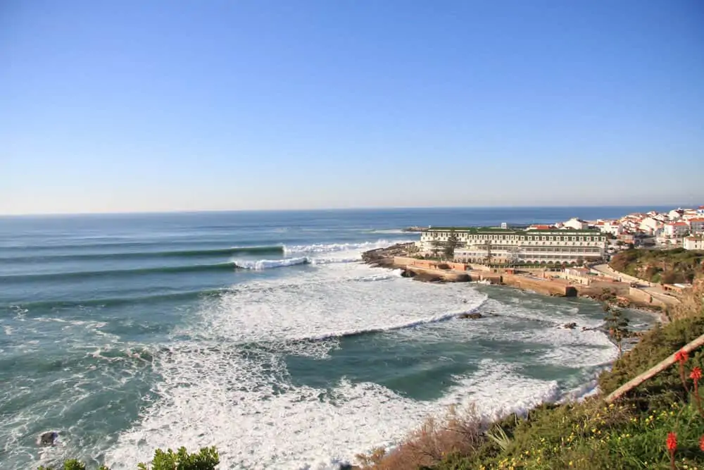 Waves breaking next to the village Ericeira in Portugal